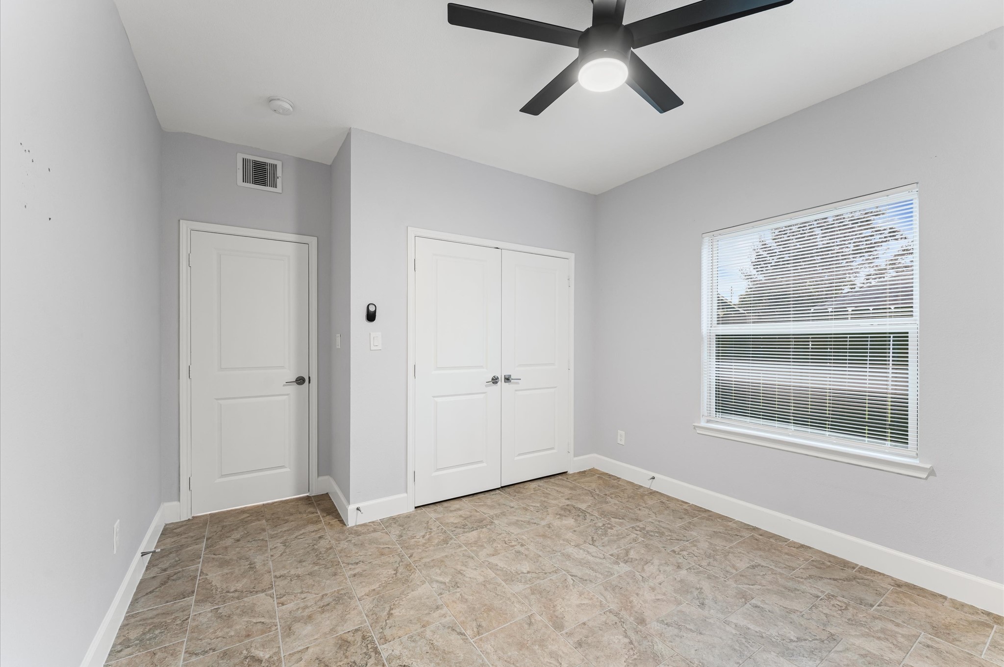 8221 Brockton Street Houston, TX 77017 - Photo 10 of 12 a view of an empty room with a window