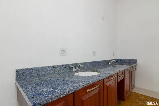 a view of an empty room with a large window