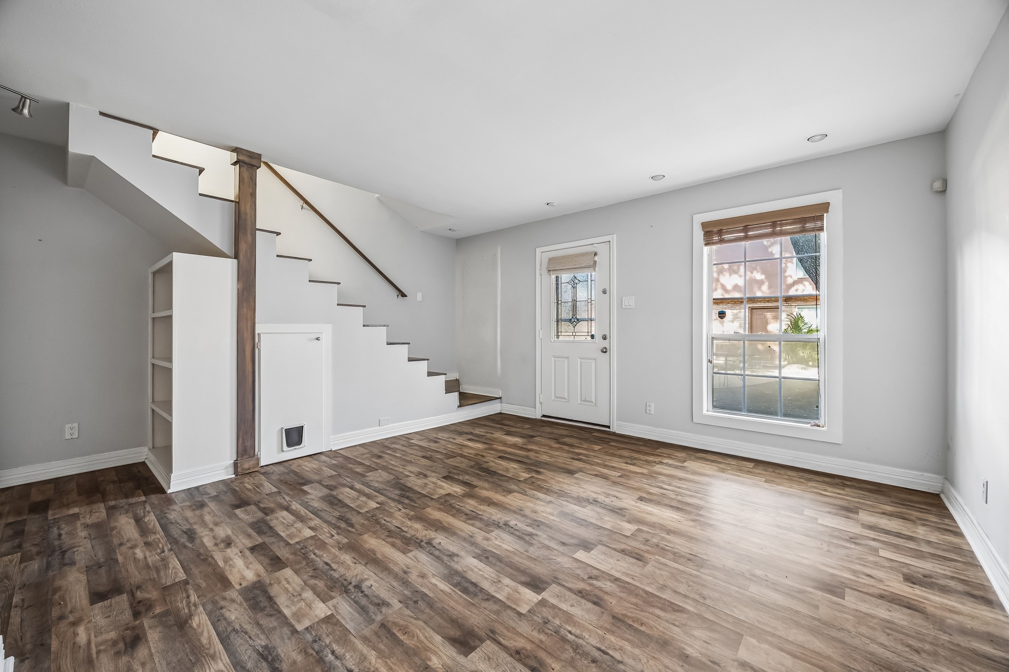 1205 Autrey Street, Unit 4 Houston, TX 77006 - Photo 2 of 11 Open and airy living room with lovely wood floors.