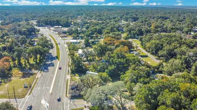 a view of a yard from a balcony