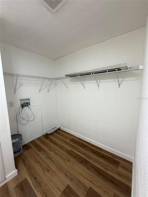 28834 Hubbard Street Leesburg, FL 34748 - Photo 13 of 22 a view of a room with racks on the wall