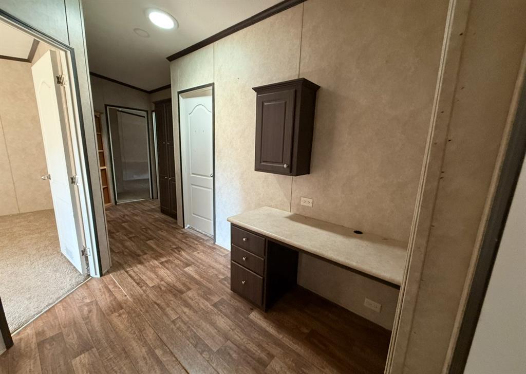 221 Farmhouse Road Springtown, TX 76082 - Photo 17 of 23 a bathroom with a sink and a mirror