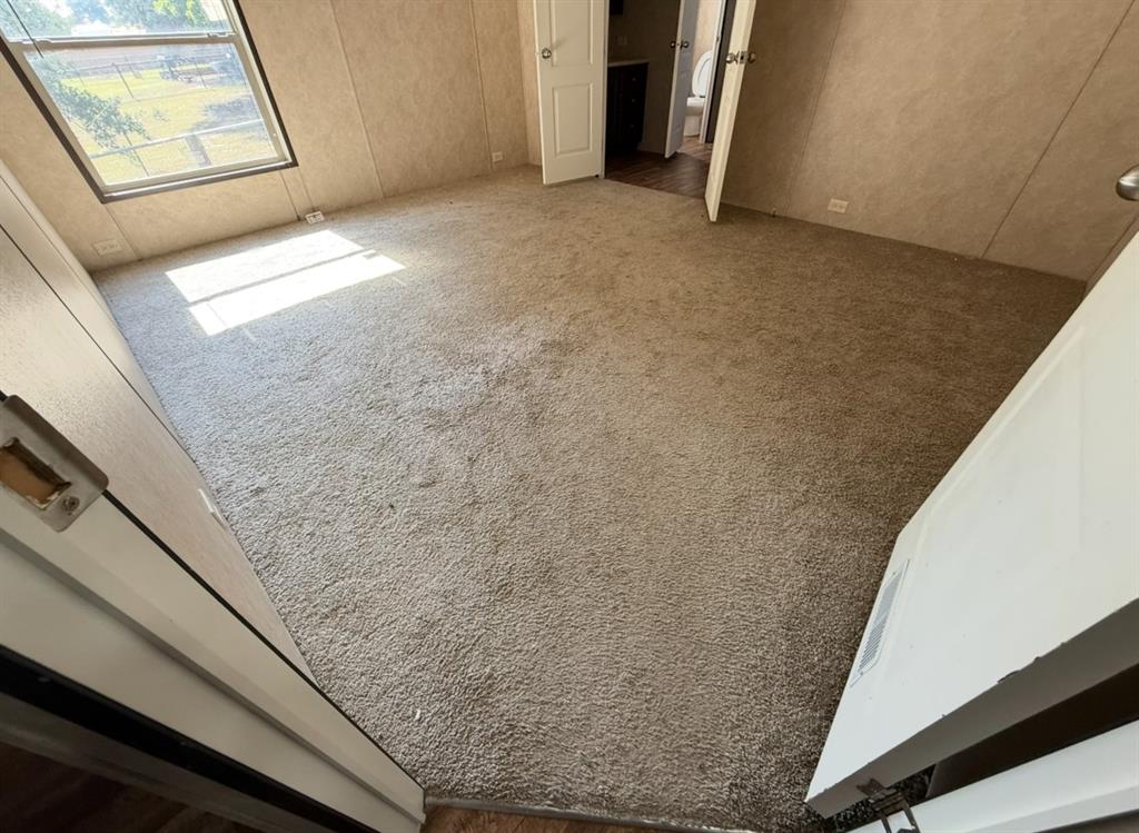 221 Farmhouse Road Springtown, TX 76082 - Photo 19 of 23 a view of balcony with window