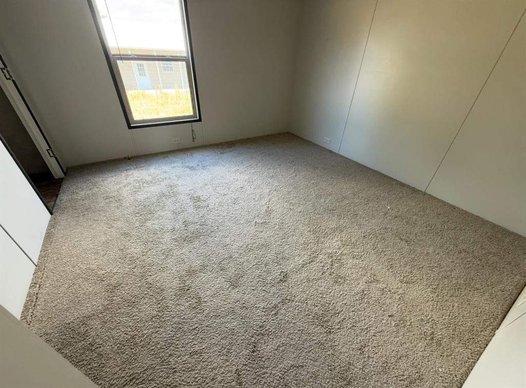 221 Farmhouse Road Springtown, TX 76082 - Photo 22 of 23 an empty room with windows