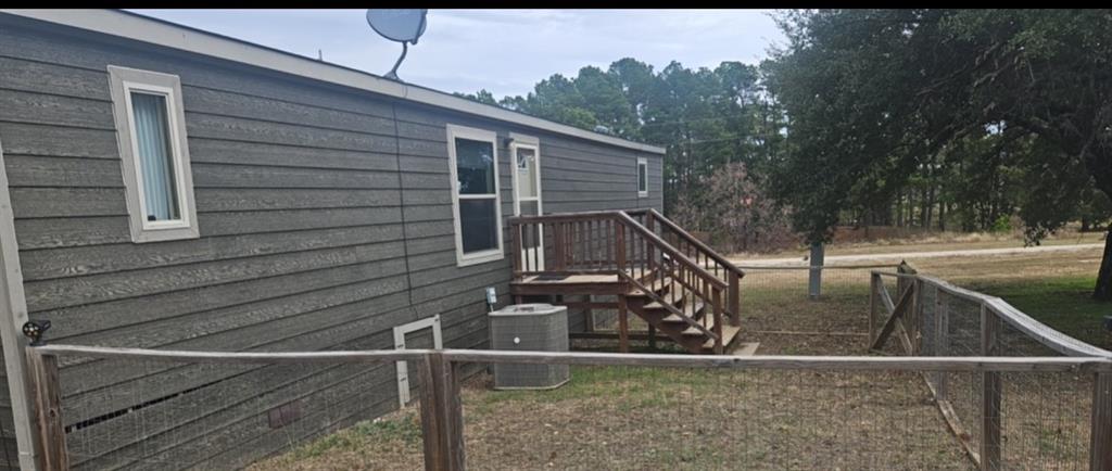 221 Farmhouse Road Springtown, TX 76082 - Photo 7 of 23 a view of backyard from deck
