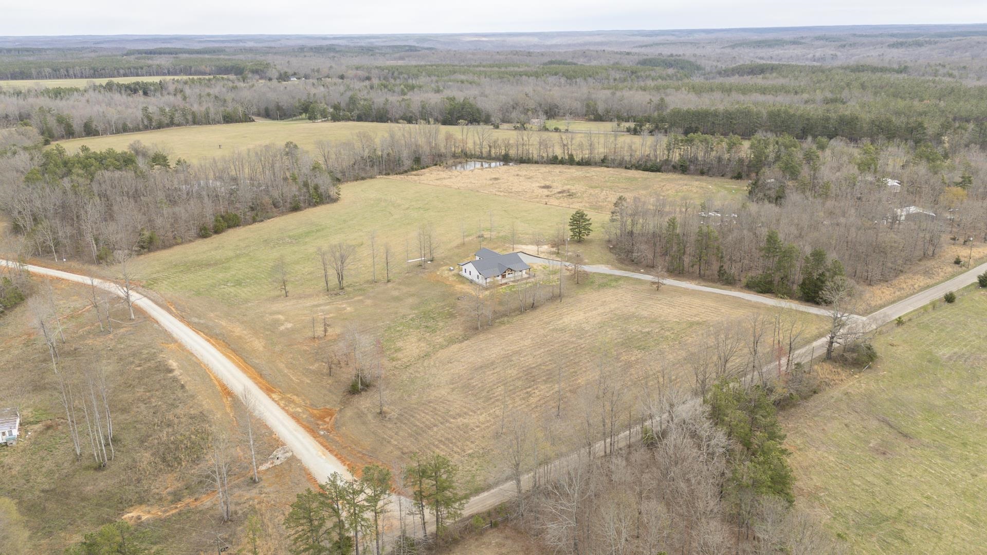 1030 Robbins Road Collinwood, TN 38450 - Photo 32 of 40 Aerial view of sparsely populated area featuring a heavily wooded area