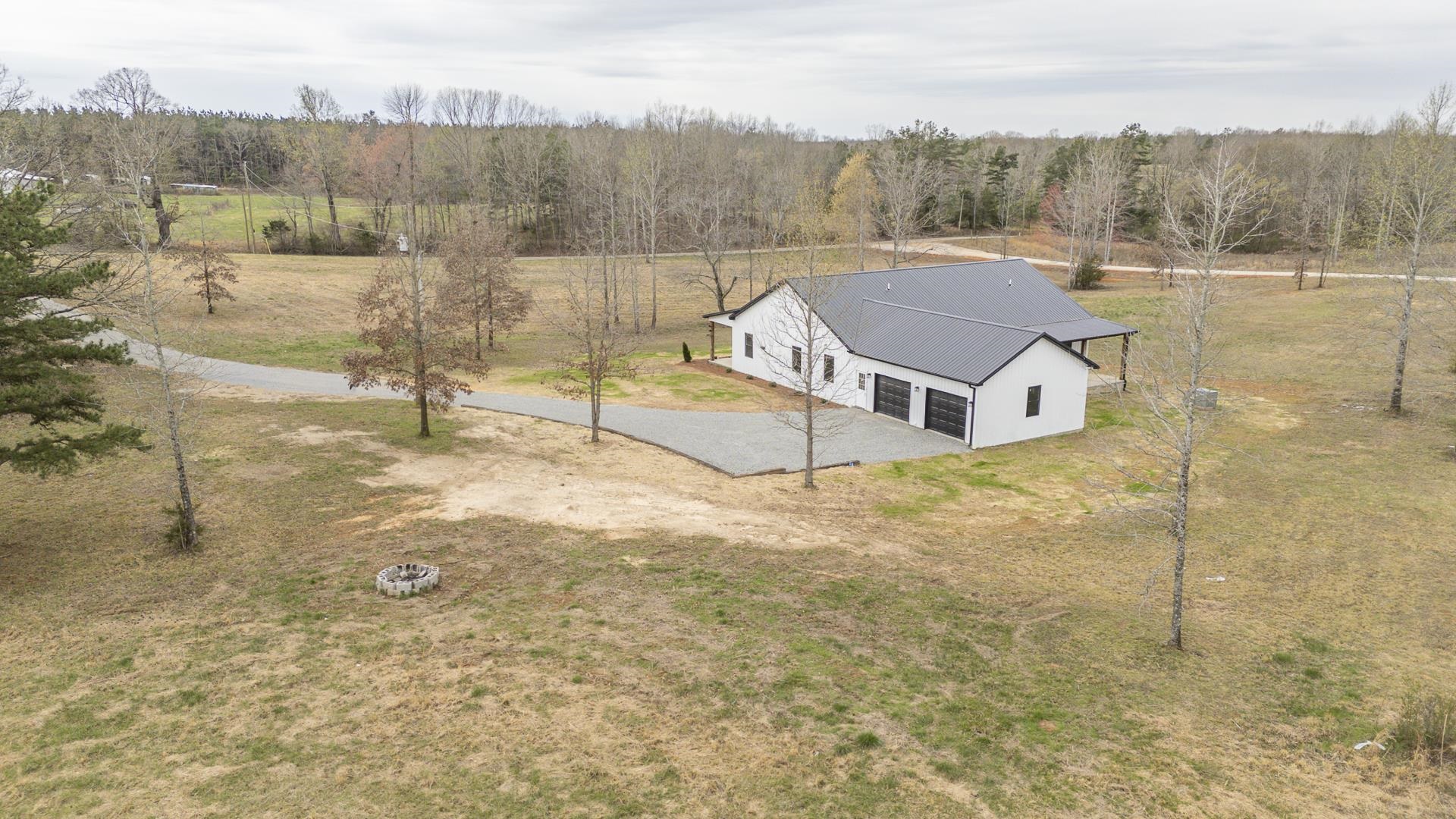 1030 Robbins Road Collinwood, TN 38450 - Photo 35 of 40 Overview of rural landscape with a heavily wooded area