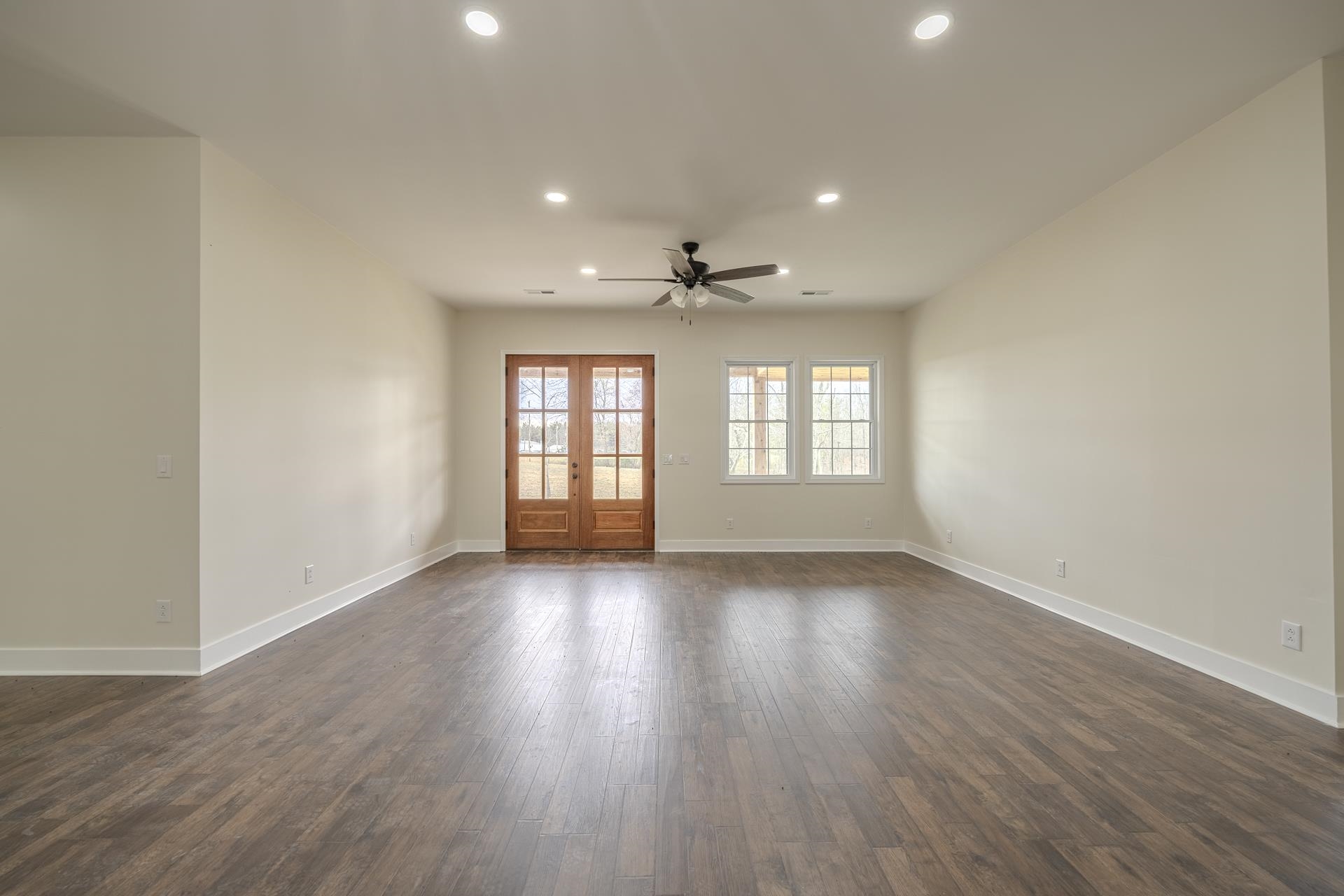 1030 Robbins Road Collinwood, TN 38450 - Photo 8 of 40 Spare room featuring recessed lighting, dark wood-style flooring, and ceiling fan