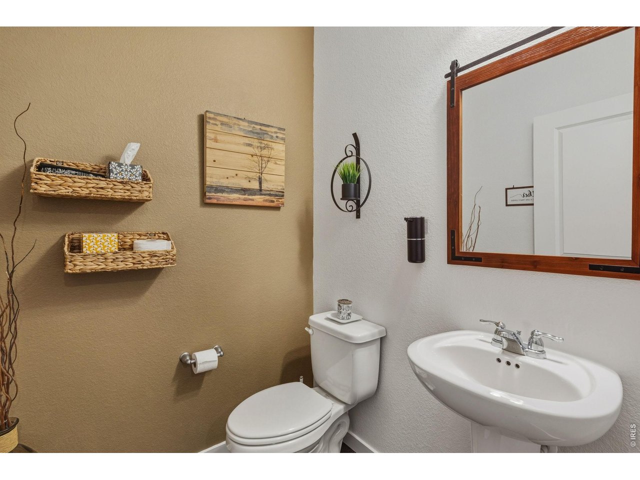 438 Bluebird Road Johnstown, CO 80534 - Photo 16 of 33 Main Level Powder Room