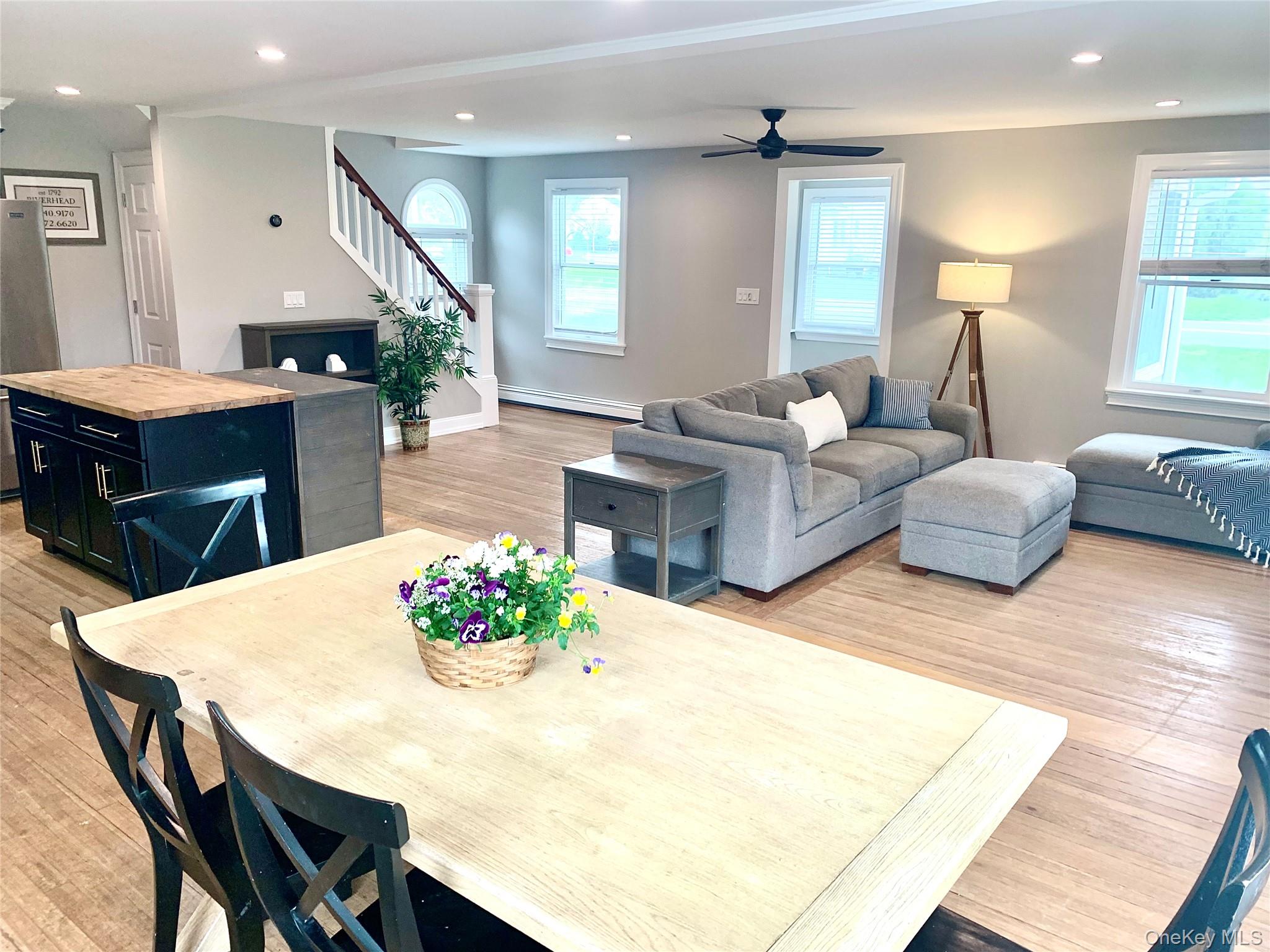 435 Middle Road Riverhead, NY 11901 - Photo 6 of 19 a living room with furniture and a table