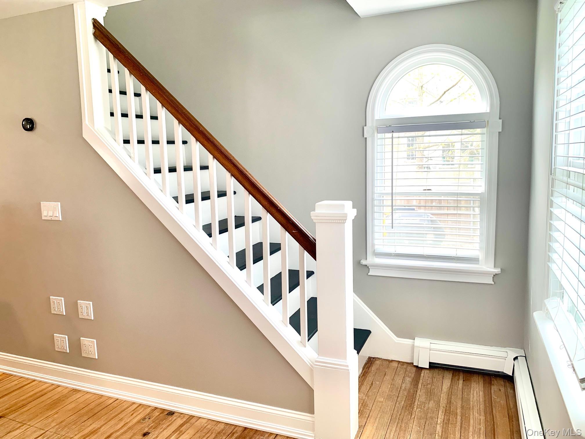 435 Middle Road Riverhead, NY 11901 - Photo 9 of 19 a view of an entryway with wooden floor