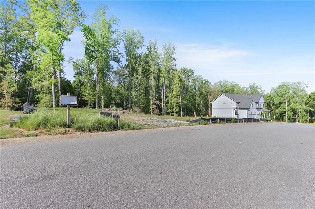 9535 Enclave Lane Gainesville, GA 30506 - Photo 13 of 15 a road with a building in the background