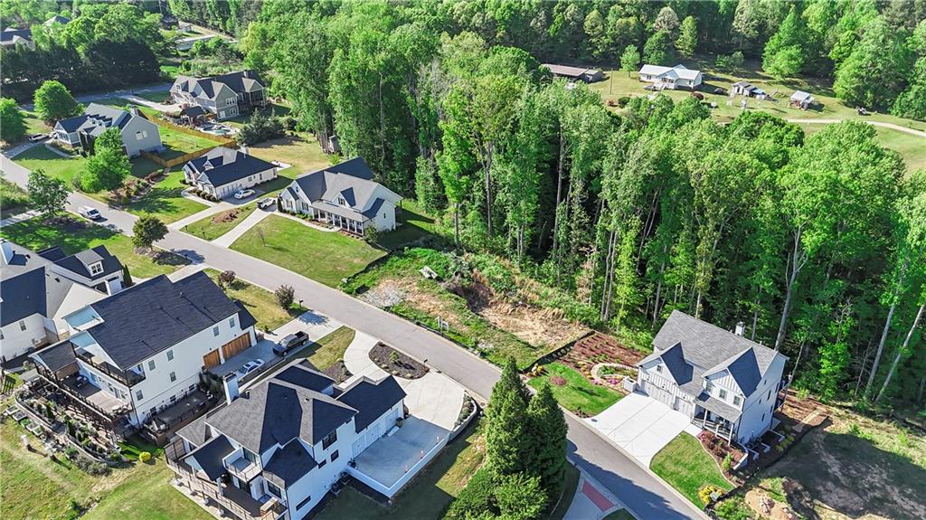 9535 Enclave Lane Gainesville, GA 30506 - Photo 6 of 15 an aerial view of a house with a yard