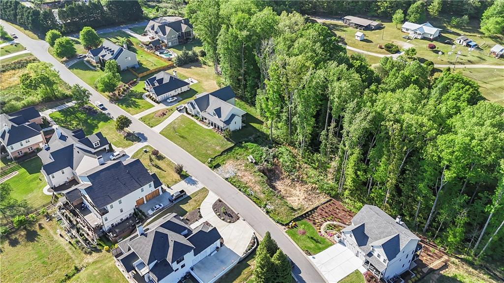 9535 Enclave Lane Gainesville, GA 30506 - Photo 8 of 15 an aerial view of a house with a yard