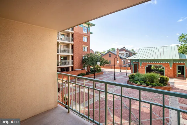 a view of balcony with furniture
