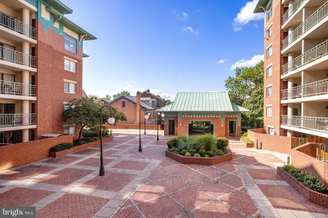 a utility room with sink dryer and washer