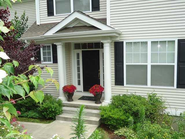 17 Winding Trail, Unit 17 Middlebury, CT 06762 - Photo 1 of 1 a front view of a house with a yard
