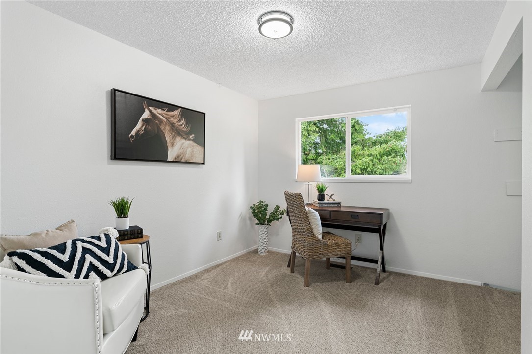 2624 166th Street Southeast Bothell, WA 98012 - Photo 17 of 29 a living room with furniture and a window