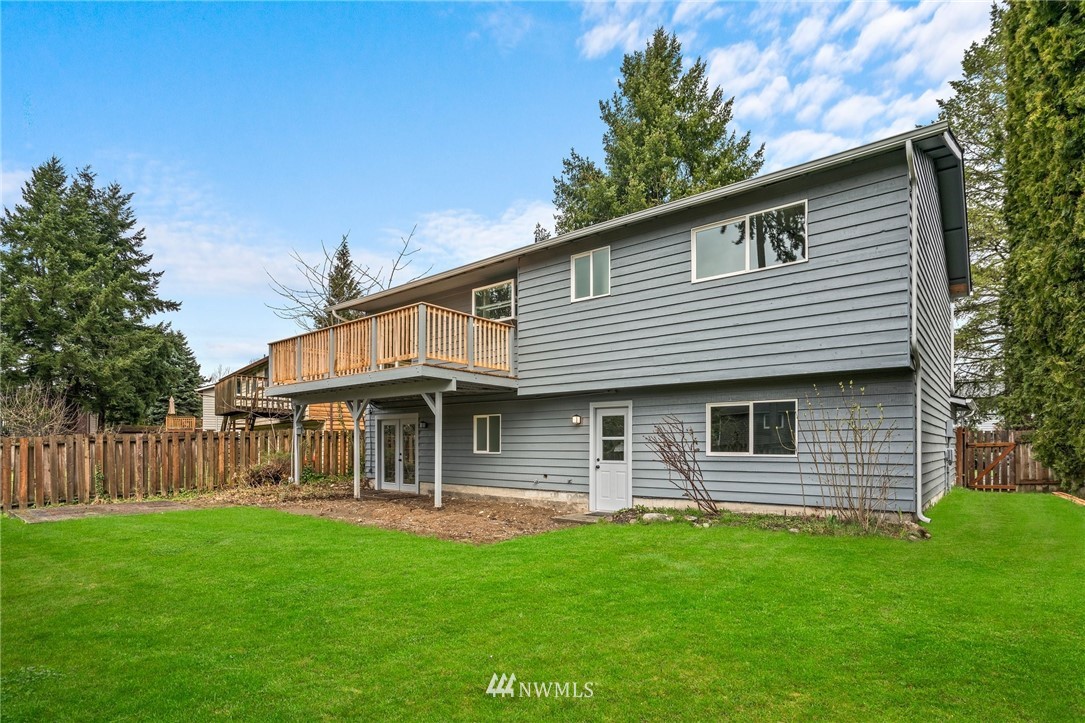 2624 166th Street Southeast Bothell, WA 98012 - Photo 26 of 29 a front view of a house with a garden