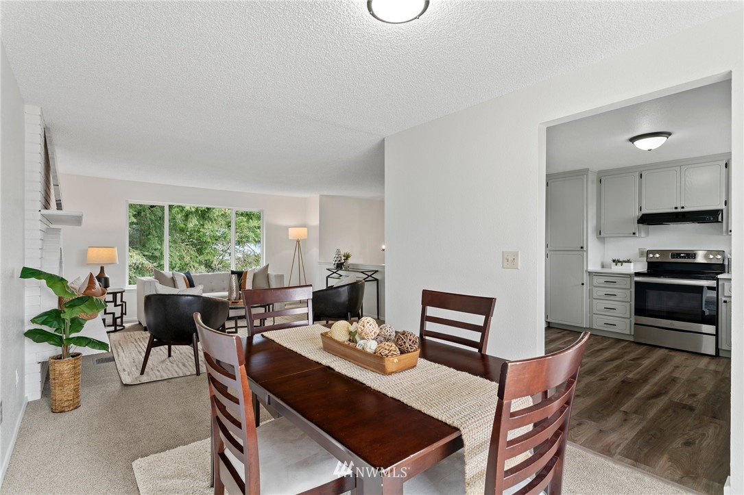 2624 166th Street Southeast Bothell, WA 98012 - Photo 6 of 29 a view of a dining room with furniture window and outside view