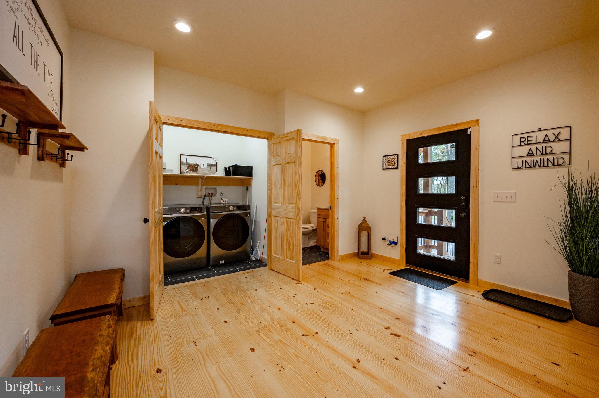 36 Irwin Way Oakland, MD 21550 - Photo 25 of 64 a view of a livingroom with washer and dryer