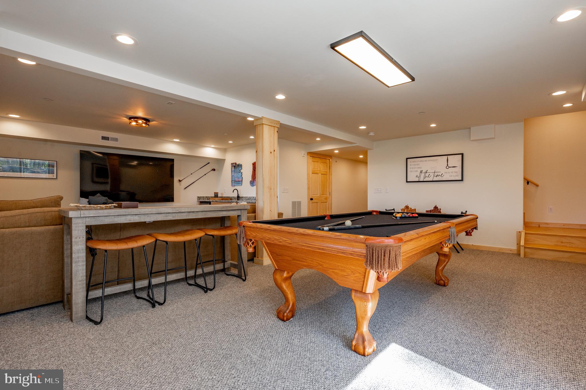 36 Irwin Way Oakland, MD 21550 - Photo 51 of 64 a room with pool table and flat screen tv