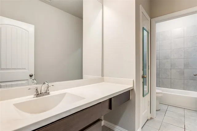 a bathroom with a sink and a bathtub