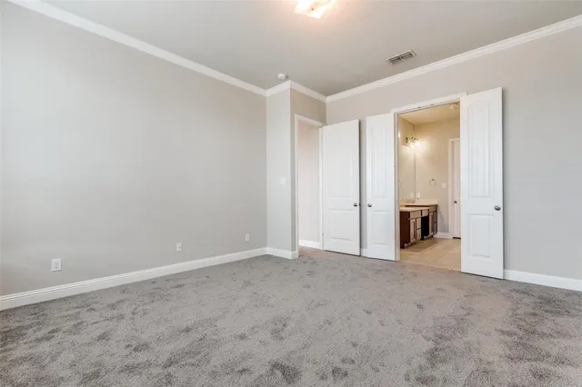 an empty room with an entrance door