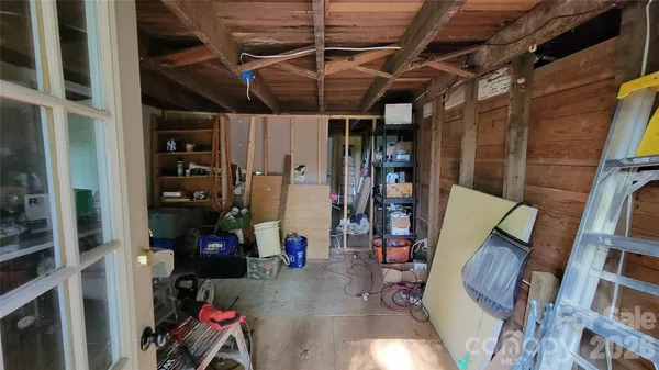 a view of a house with a small yard