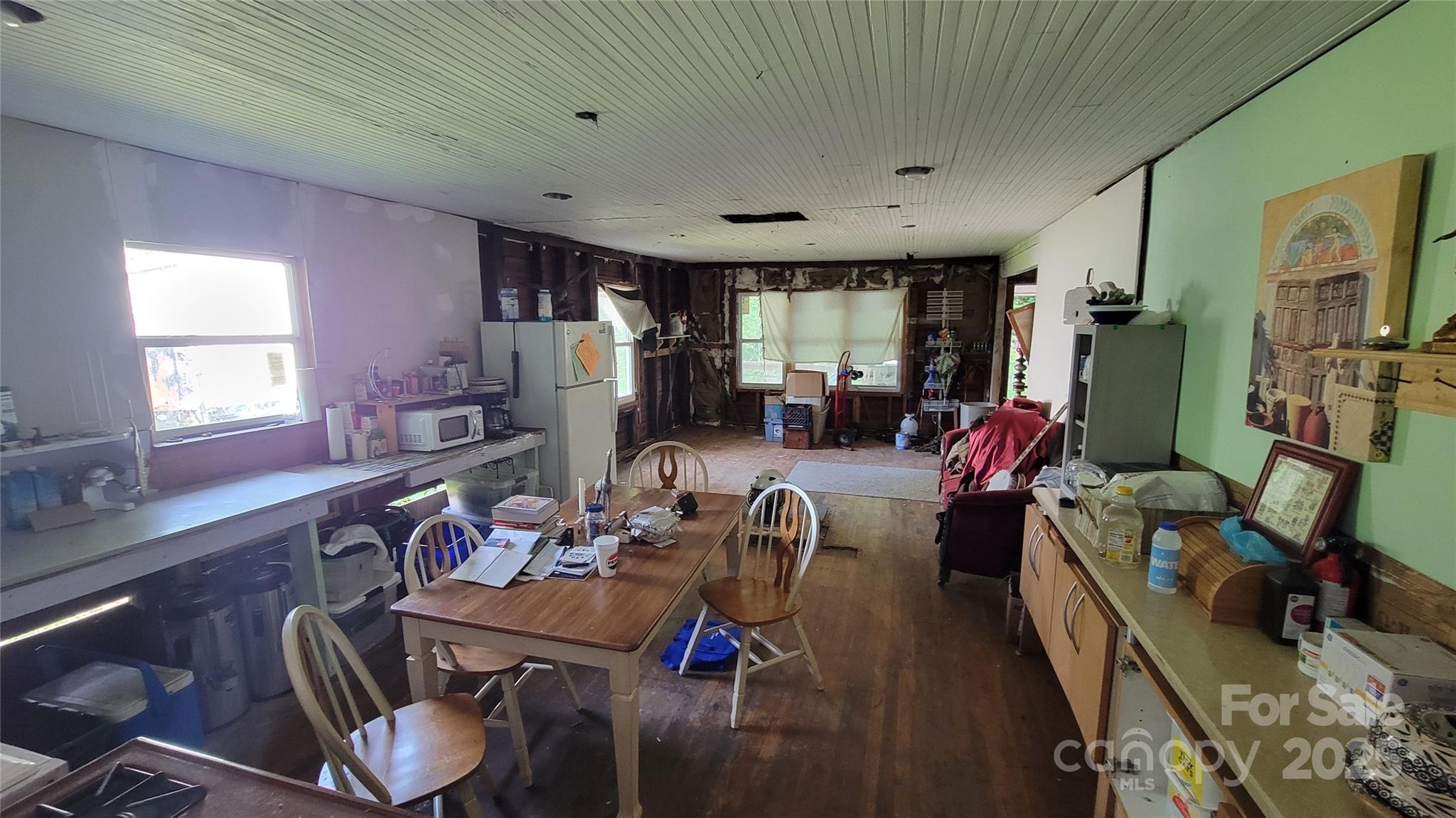 160 Cleveland Road Tryon, NC 28782 - Photo 5 of 42 a view of a dining room with furniture window and outside view