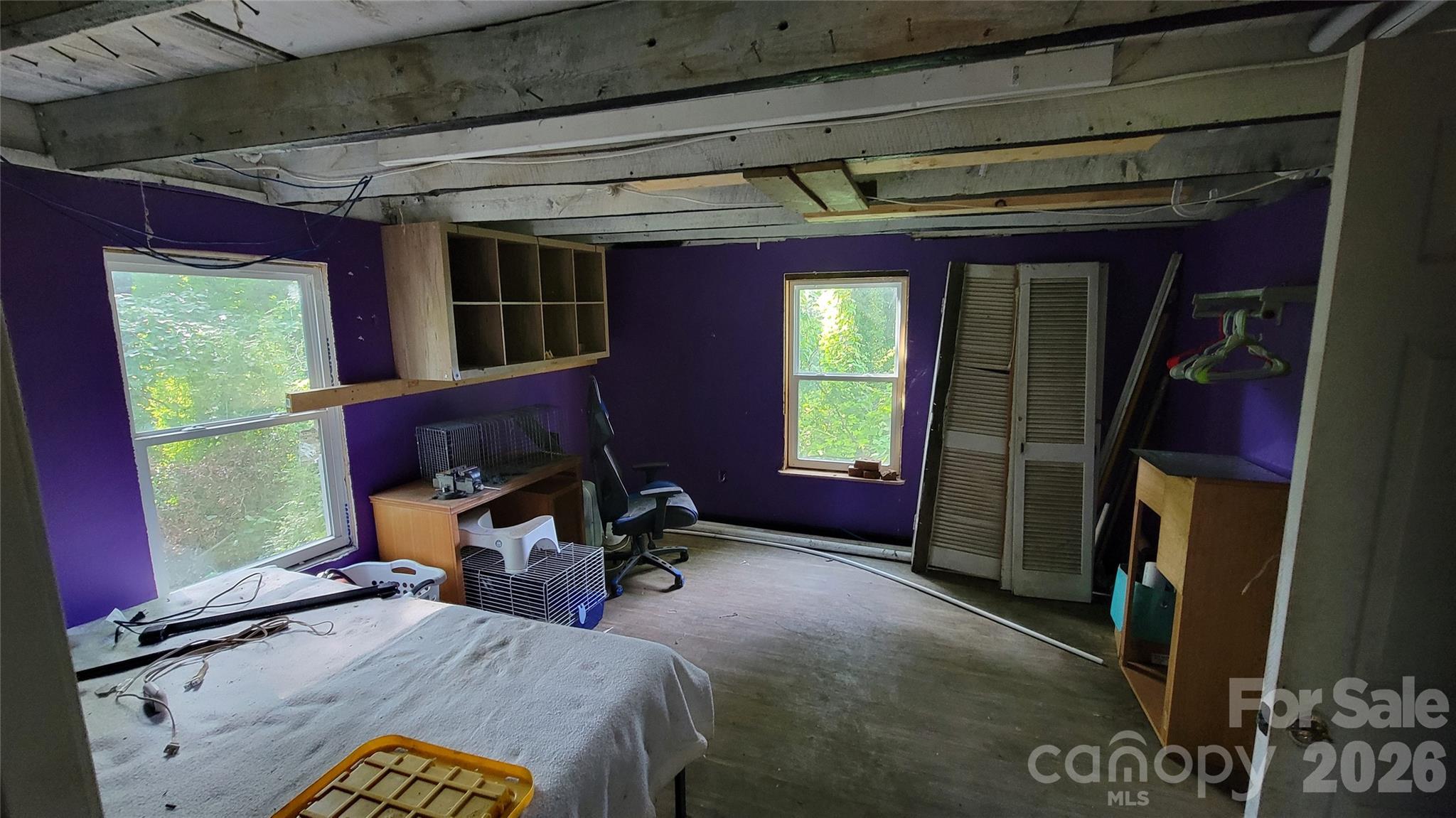 160 Cleveland Road Tryon, NC 28782 - Photo 9 of 40 a bed room with a bed and a window