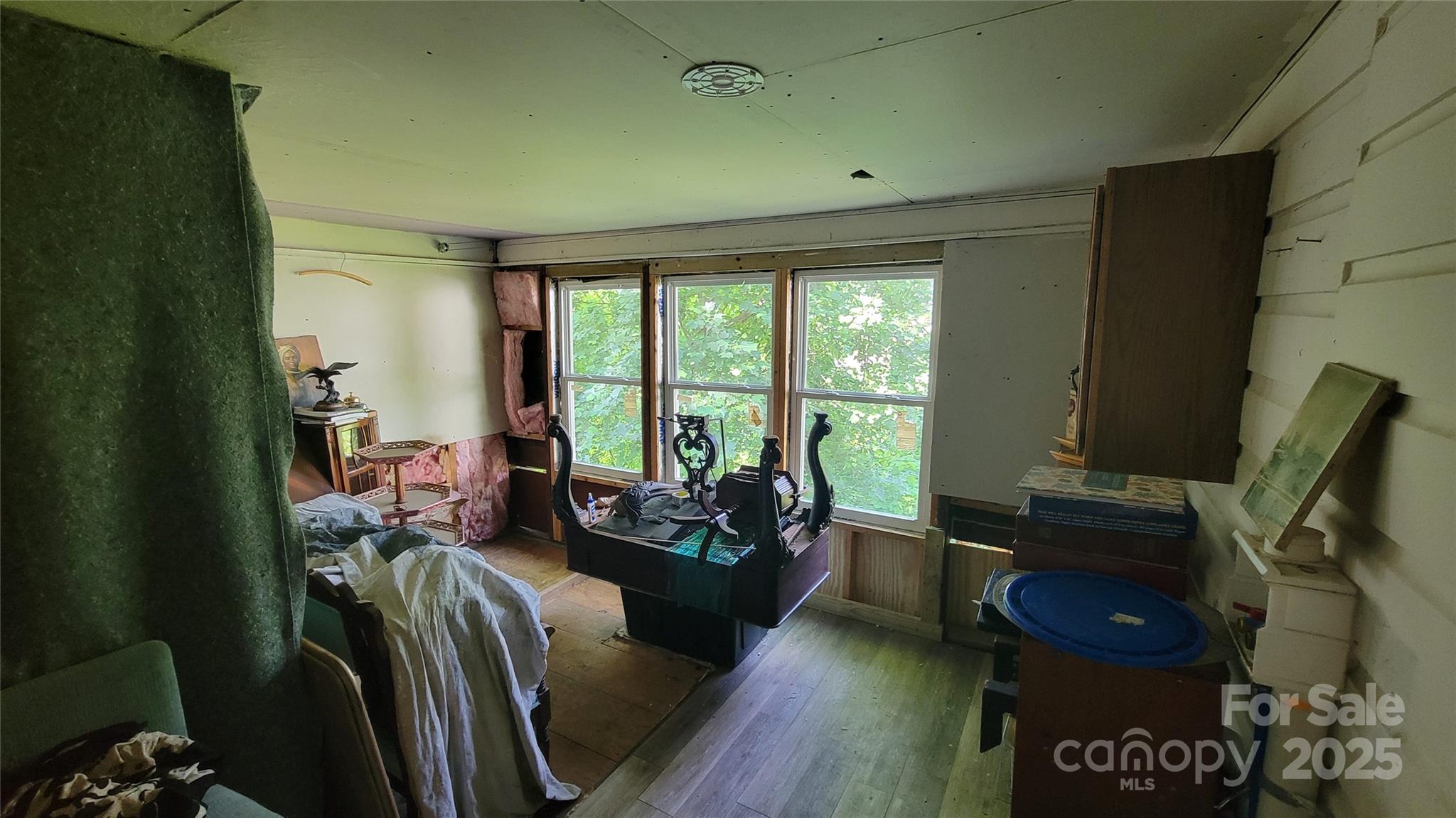 160 Cleveland Road Tryon, NC 28782 - Photo 10 of 42 a living room with furniture and a flat screen tv