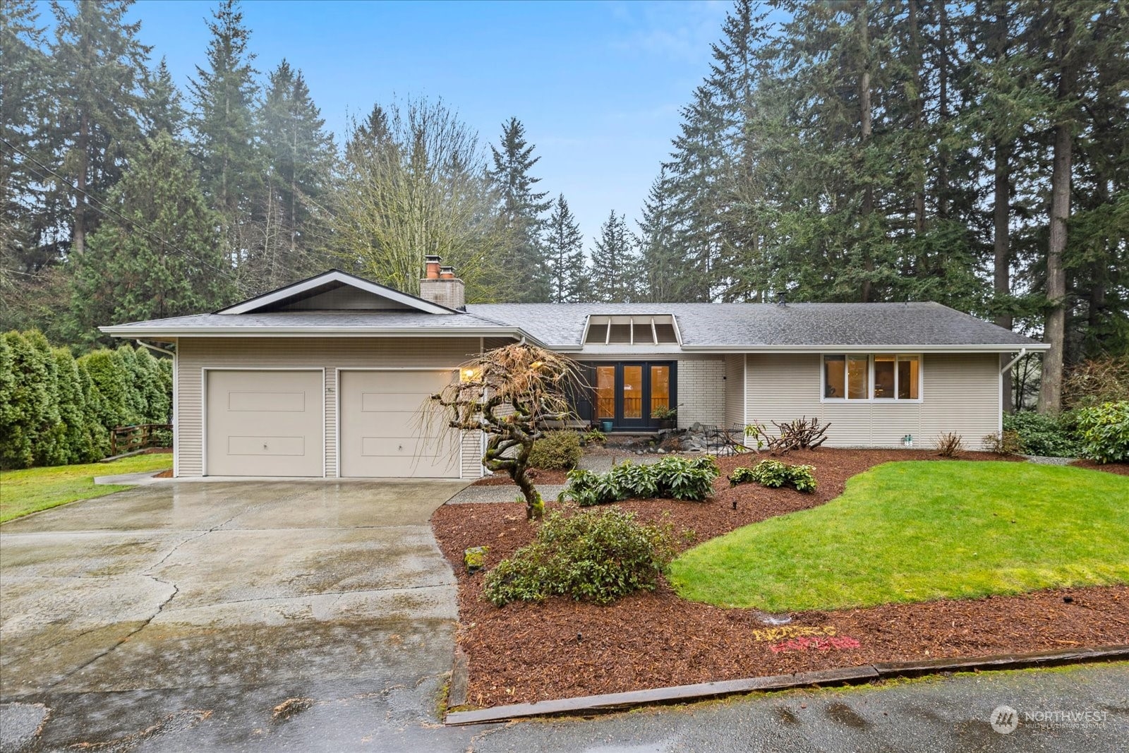 9505 Northeast 198th Street Bothell, WA 98011 - Photo 1 of 1 a front view of a house with garden