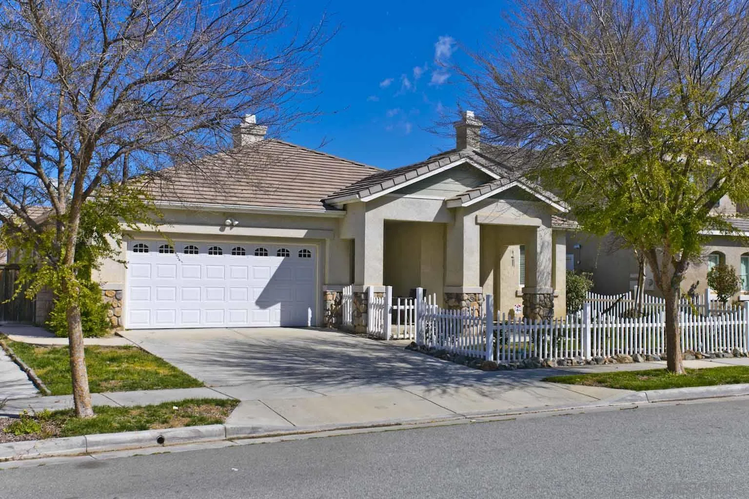 4660 Duskywing Road Hemet, CA 92545 - Photo 1 of 29 a view of a house with a patio and a yard