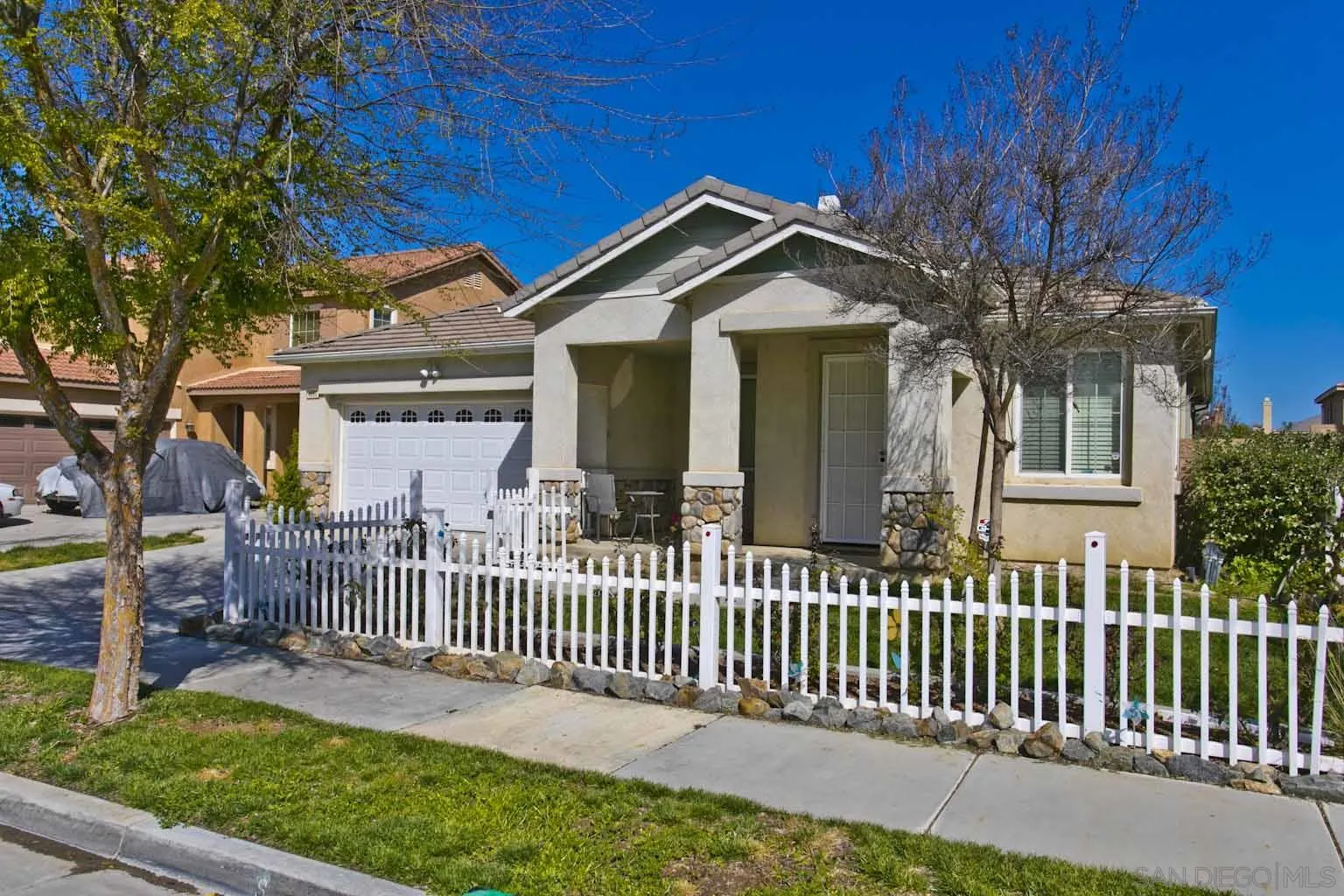 4660 Duskywing Road Hemet, CA 92545 - Photo 29 of 29 a front view of a house with a garden