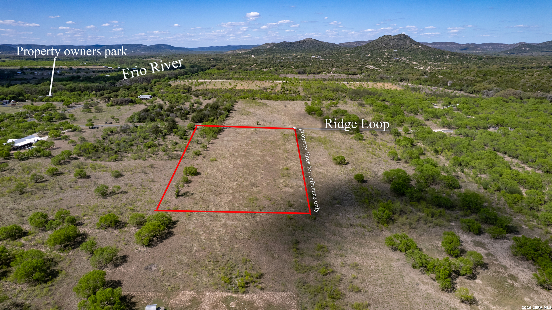 869 Ridge Loop Rio Frio, TX 78879 - Photo 16 of 40 a view of a lake with a mountain