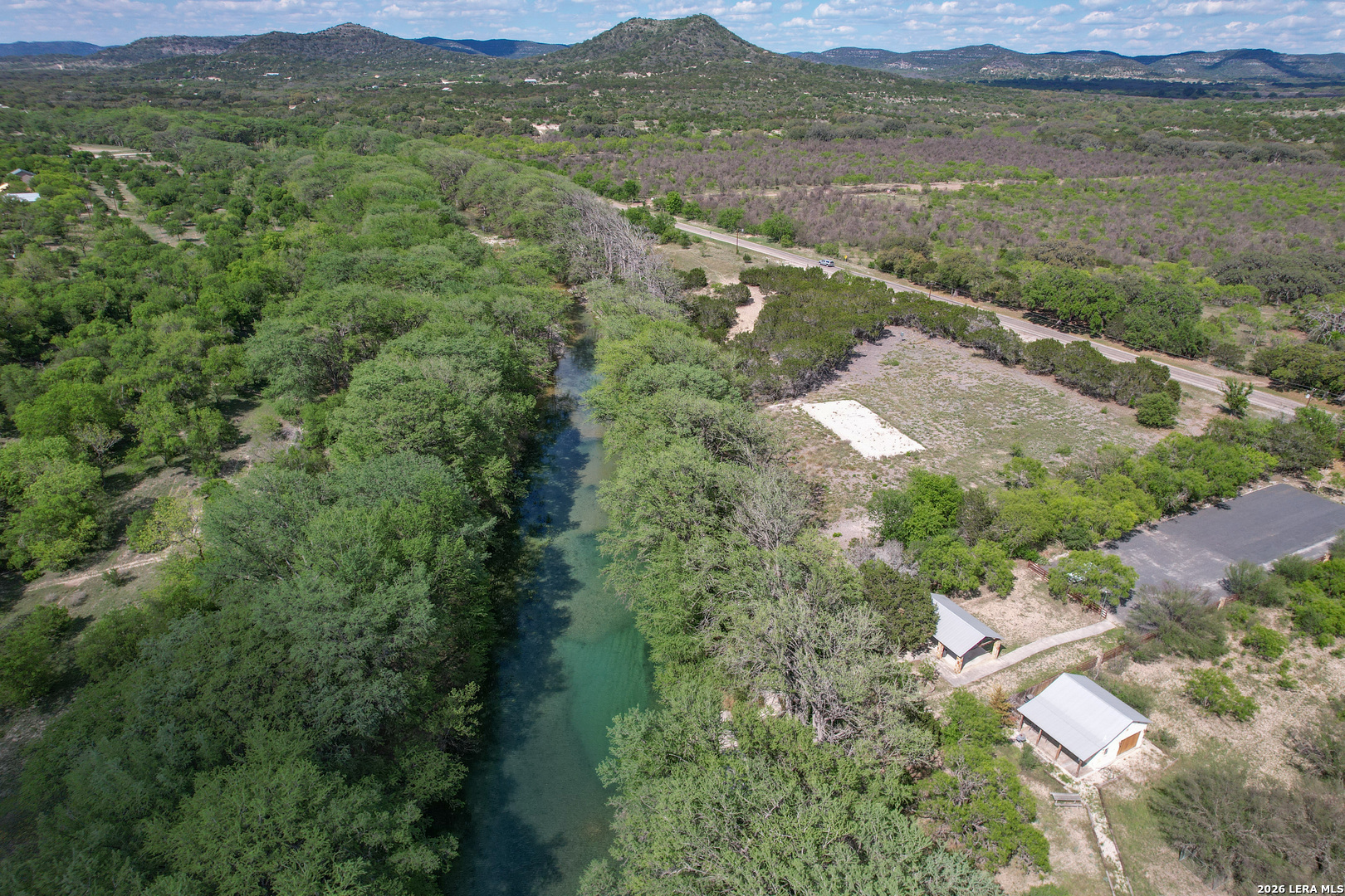 869 Ridge Loop Rio Frio, TX 78879 - Photo 32 of 40 an aerial view of houses with yard