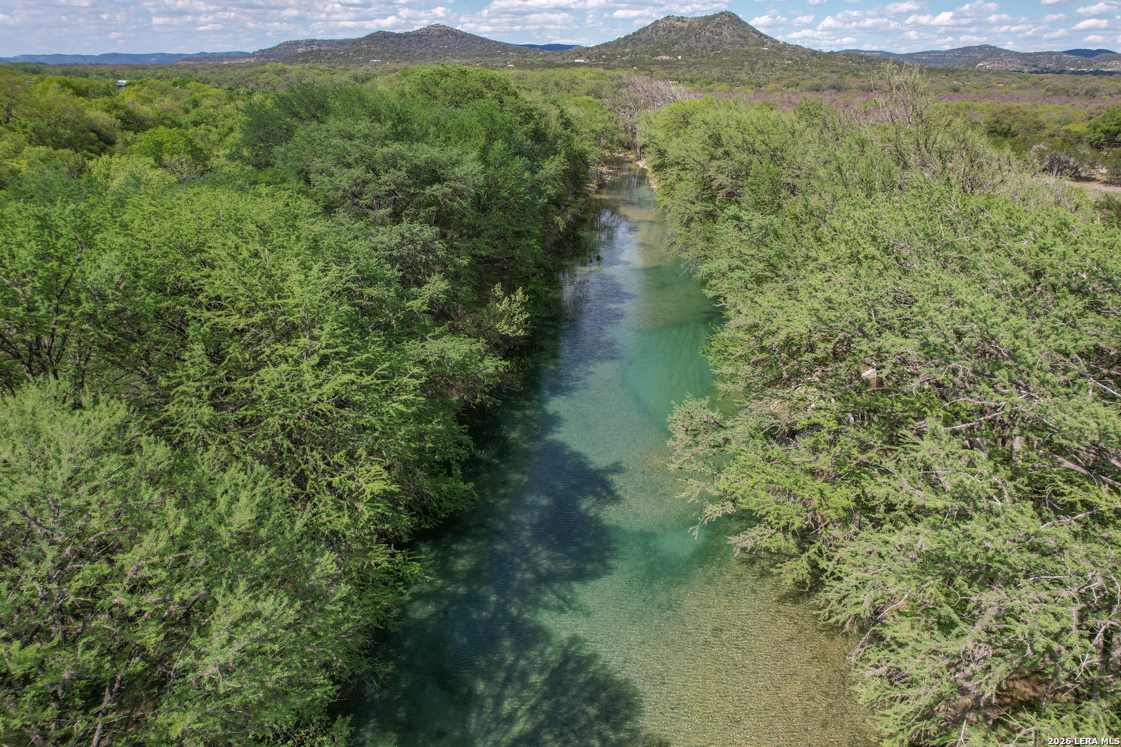 869 Ridge Loop Rio Frio, TX 78879 - Photo 35 of 40 a view of lake view and mountain view
