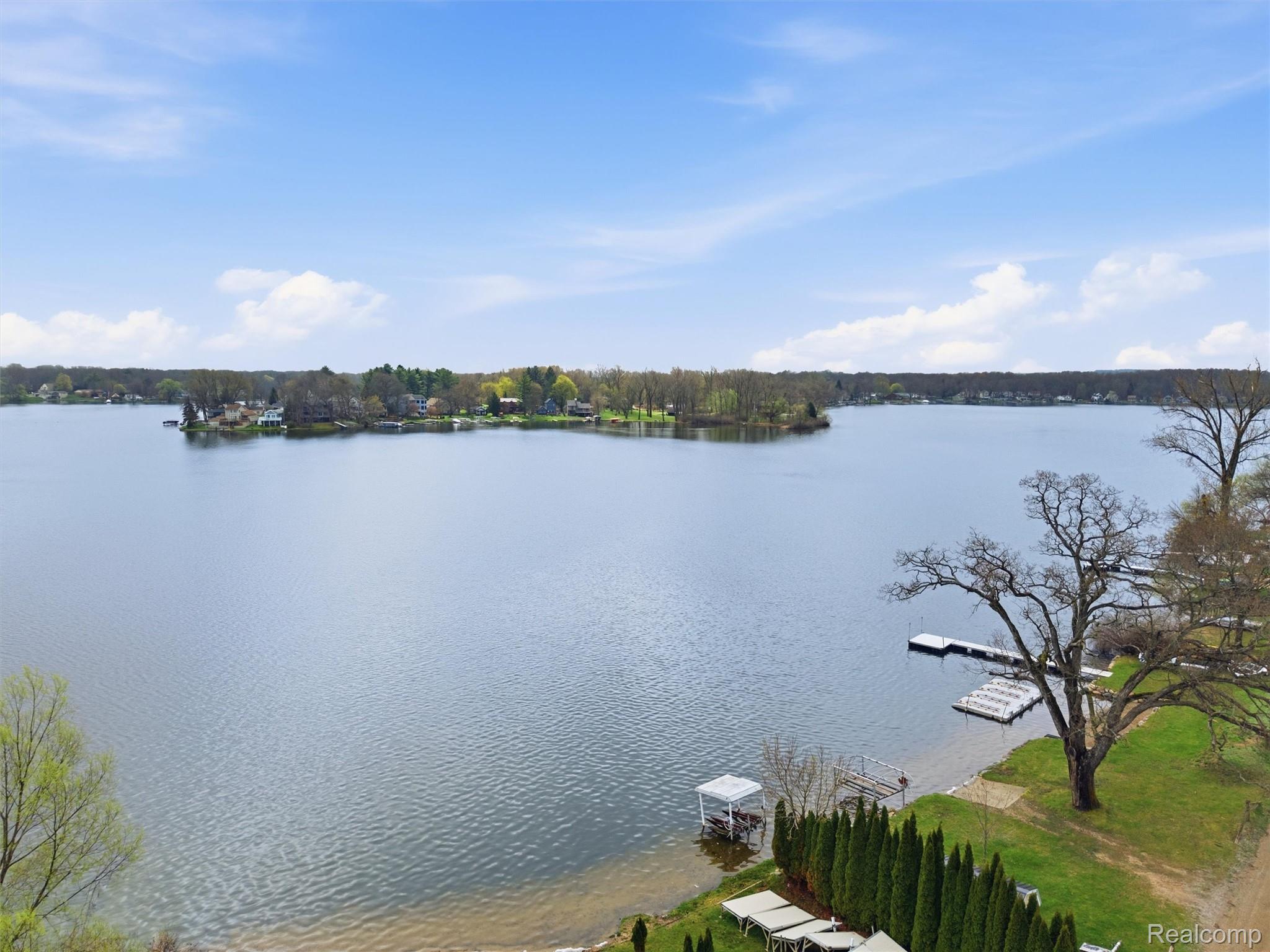 11810 Scenic Valley Road Davisburg, MI 48350 - Photo 40 of 46 Water view with a dock
