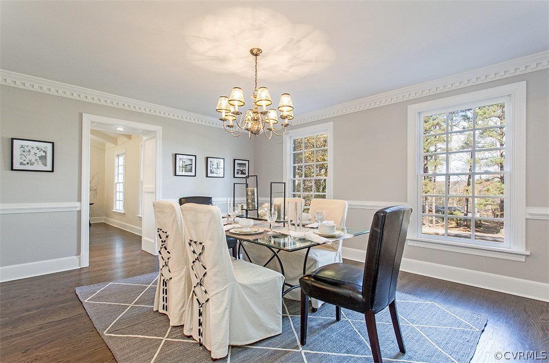9733 Cherokee Road Richmond, VA 23235 - Photo 6 of 26 a view of a dining room with furniture and window