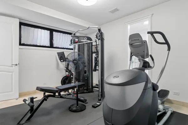 a view of a room with gym equipment