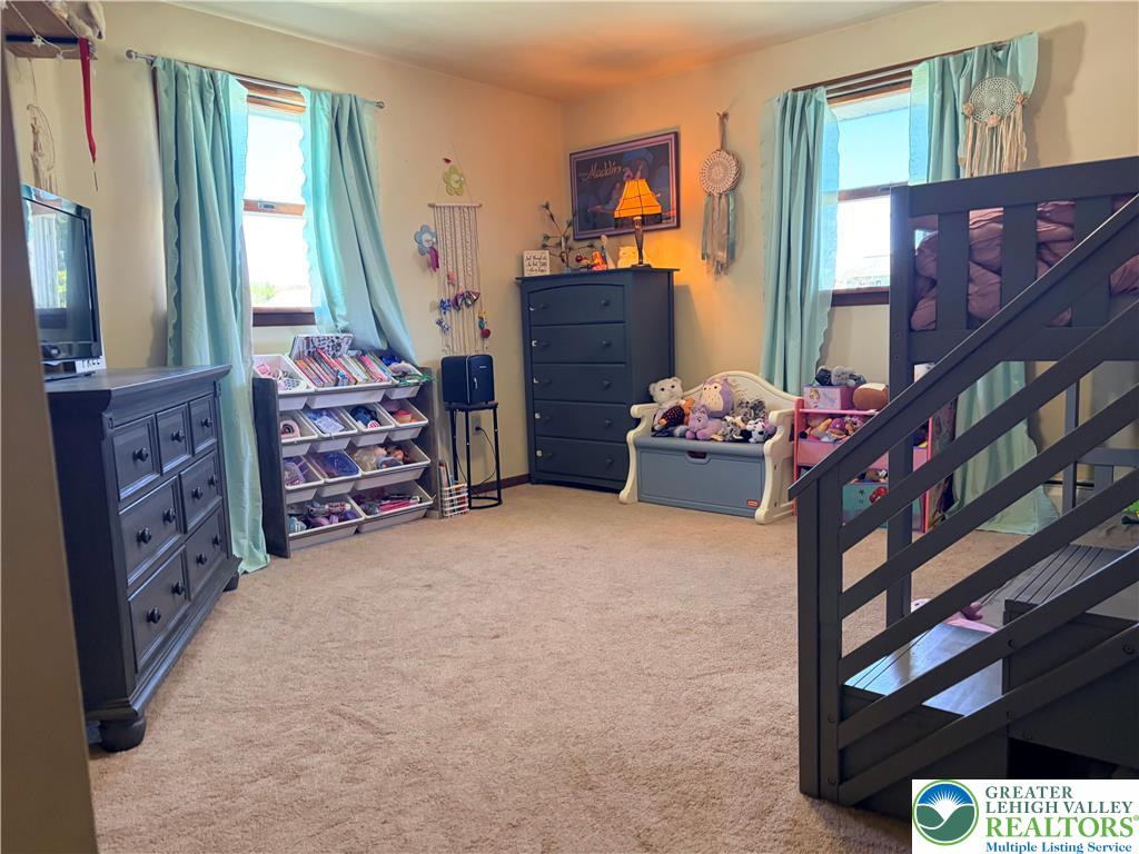100 Hazelwood Road Lehighton, PA 18235 - Photo 28 of 31 a bedroom with furniture and a window