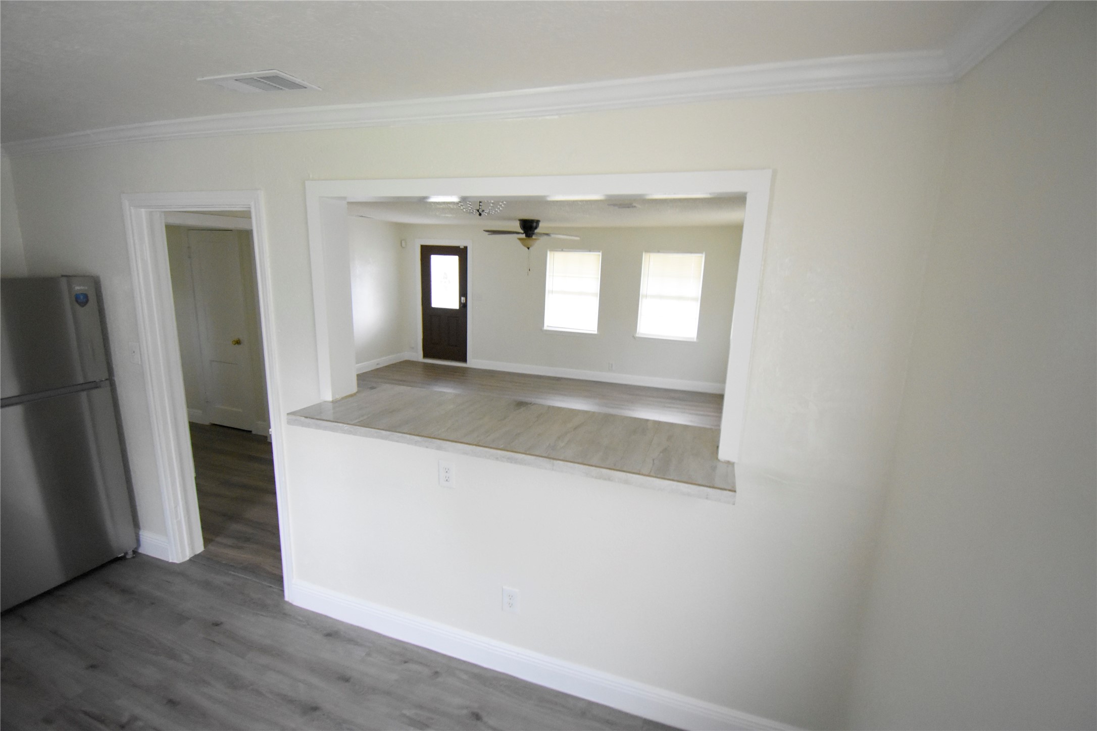 6229 Clover Ridge Street Houston, TX 77087 - Photo 17 of 25 a view of hallway with wooden floor