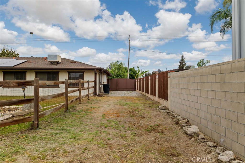 2065 Jenkins Road Bakersfield, CA 93314 - Photo 4 of 59 a view of a house with backyard and sitting area