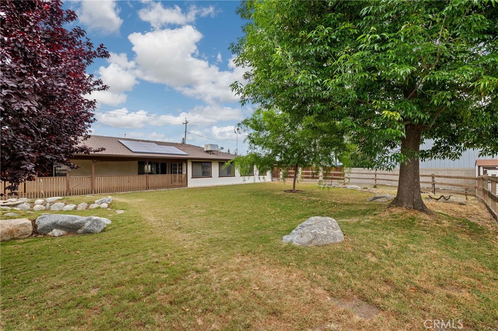 2065 Jenkins Road Bakersfield, CA 93314 - Photo 51 of 59 a view of a house with a yard