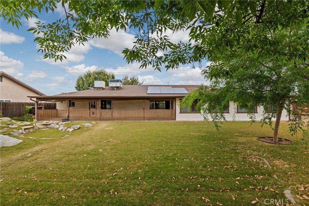 2065 Jenkins Road Bakersfield, CA 93314 - Photo 52 of 59 a front view of house with yard and trees