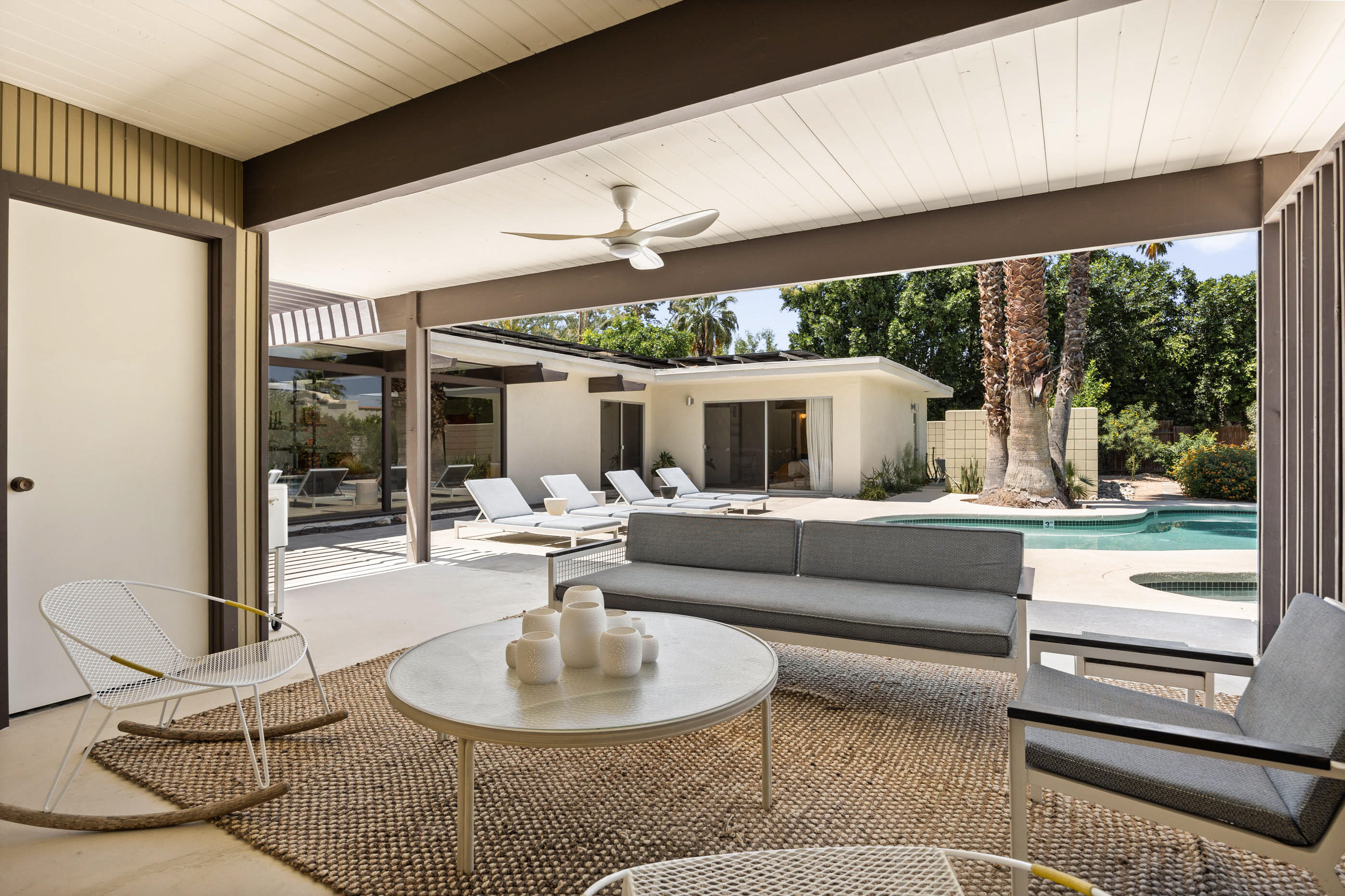 74110 Covered Wagon Trail Palm Desert, CA 92260 - Photo 15 of 44 a living room with furniture and a large window