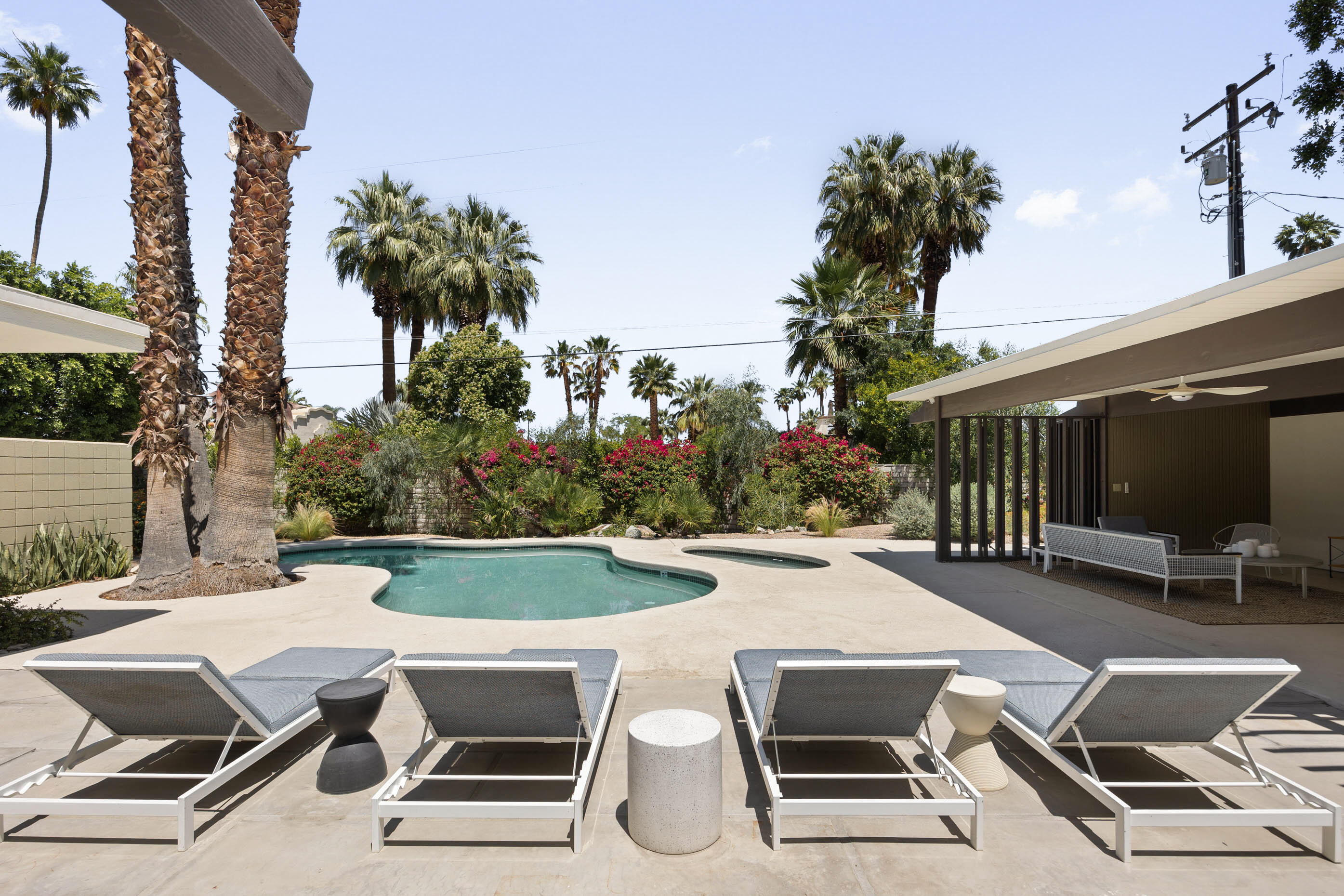74110 Covered Wagon Trail Palm Desert, CA 92260 - Photo 20 of 44 a view of a patio with swimming pool