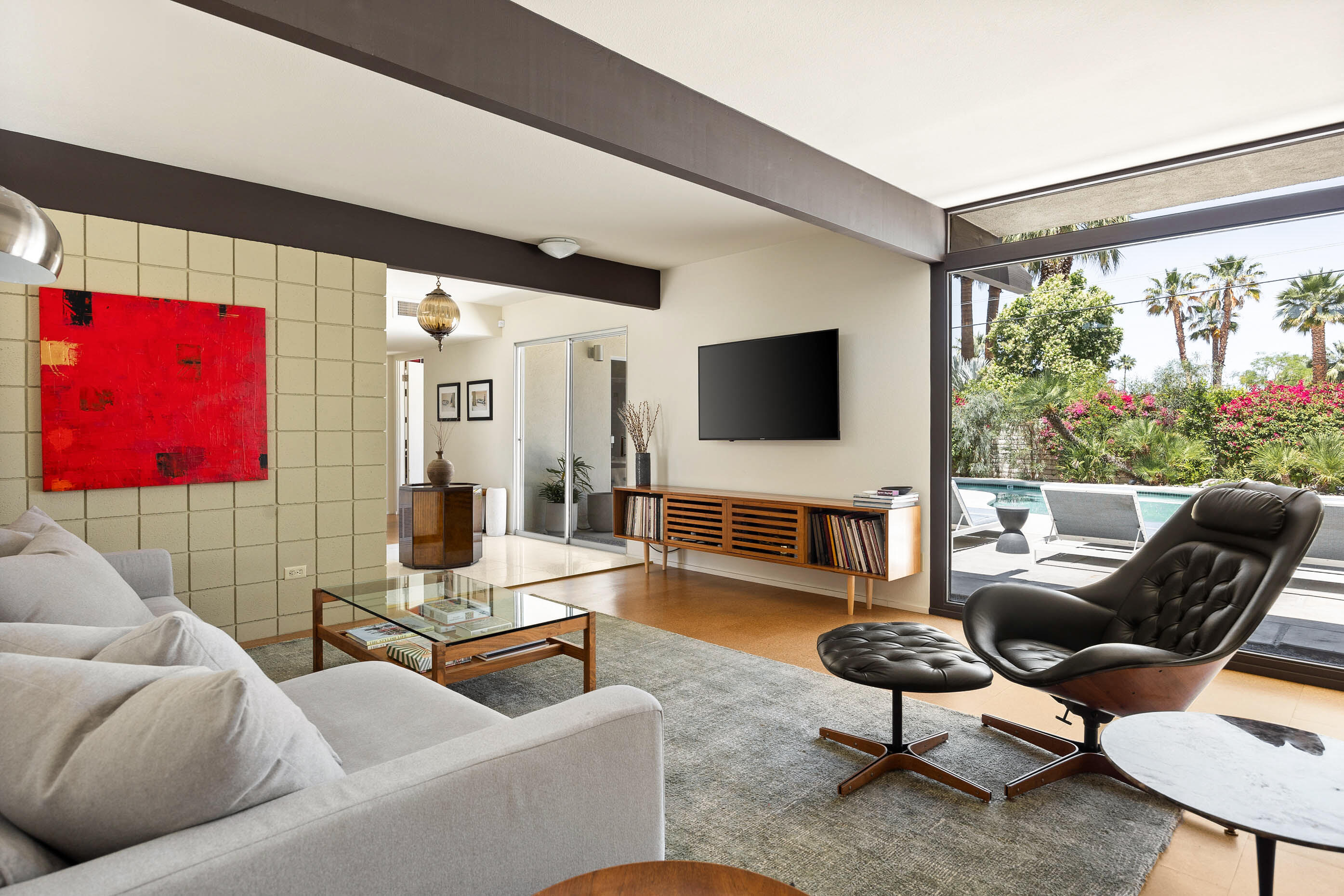 74110 Covered Wagon Trail Palm Desert, CA 92260 - Photo 22 of 44 a living room with furniture and a flat screen tv