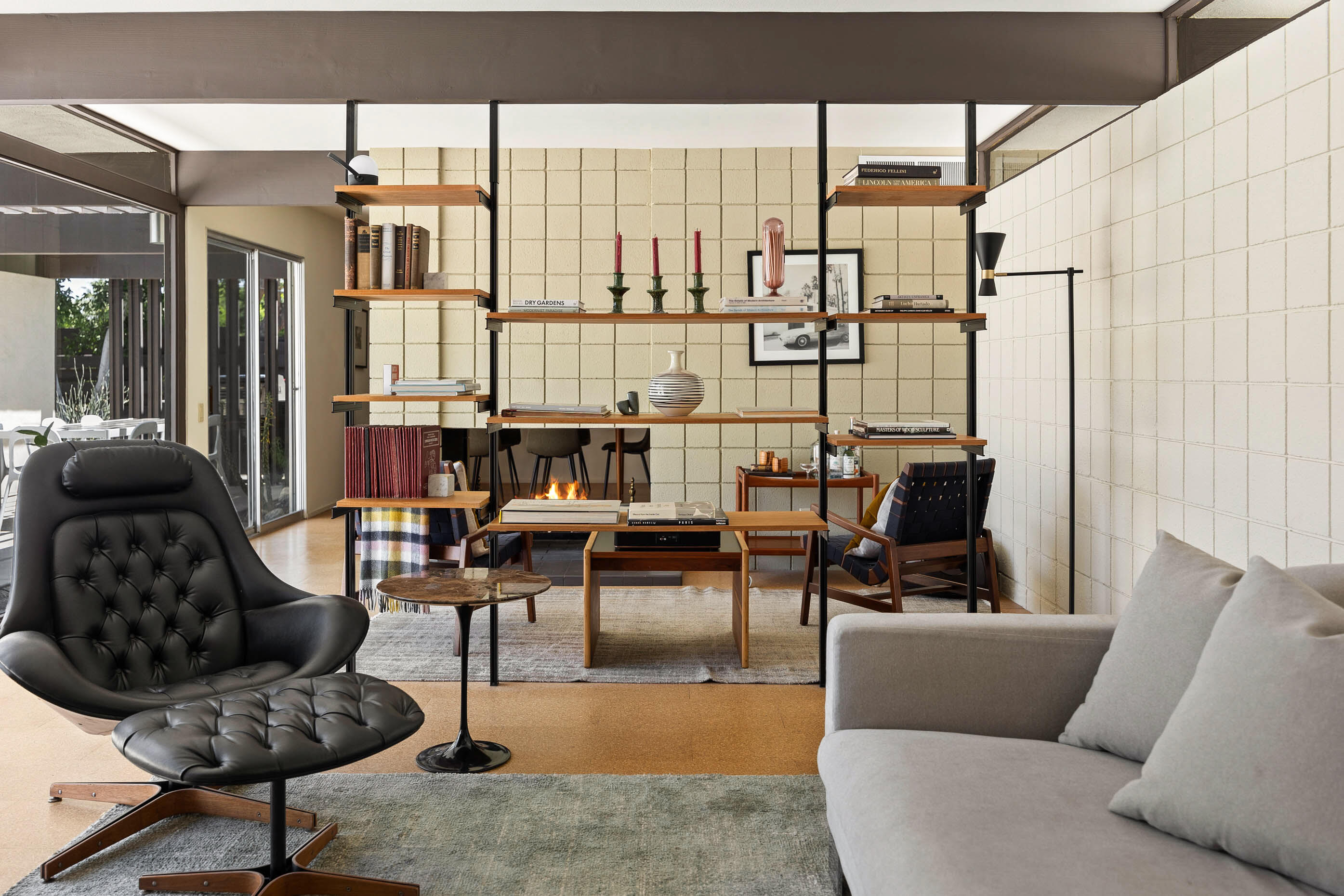 74110 Covered Wagon Trail Palm Desert, CA 92260 - Photo 23 of 44 a living room with furniture and floor to ceiling window